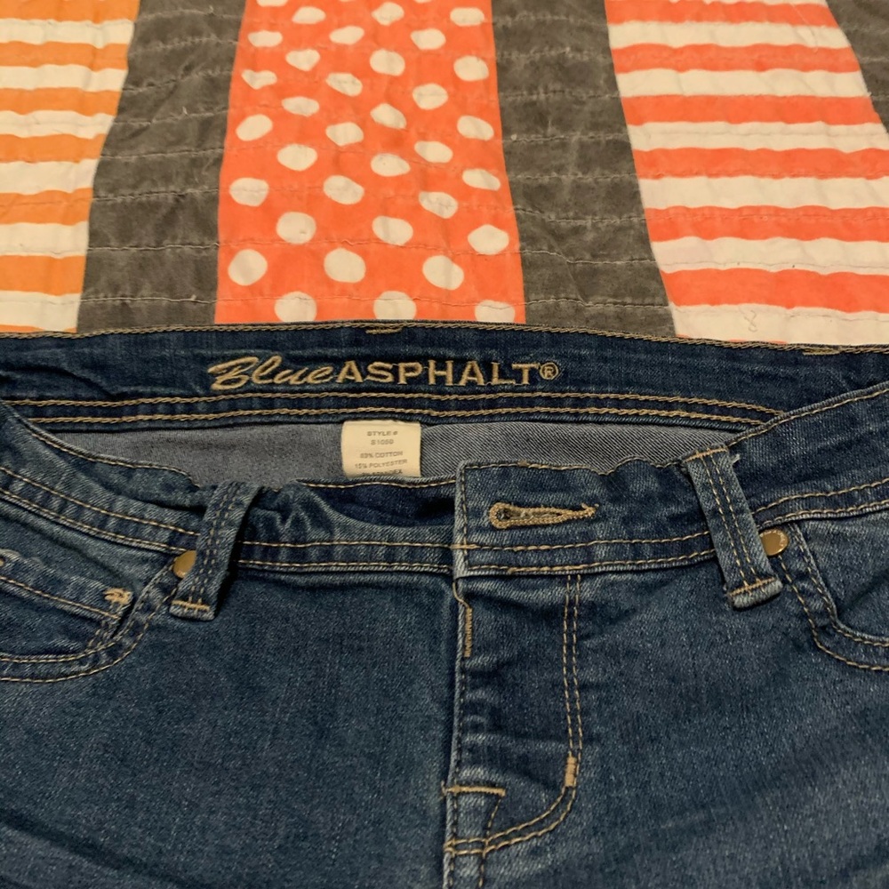 Blue Asphalt blue skinny bootcut ripple jeans.